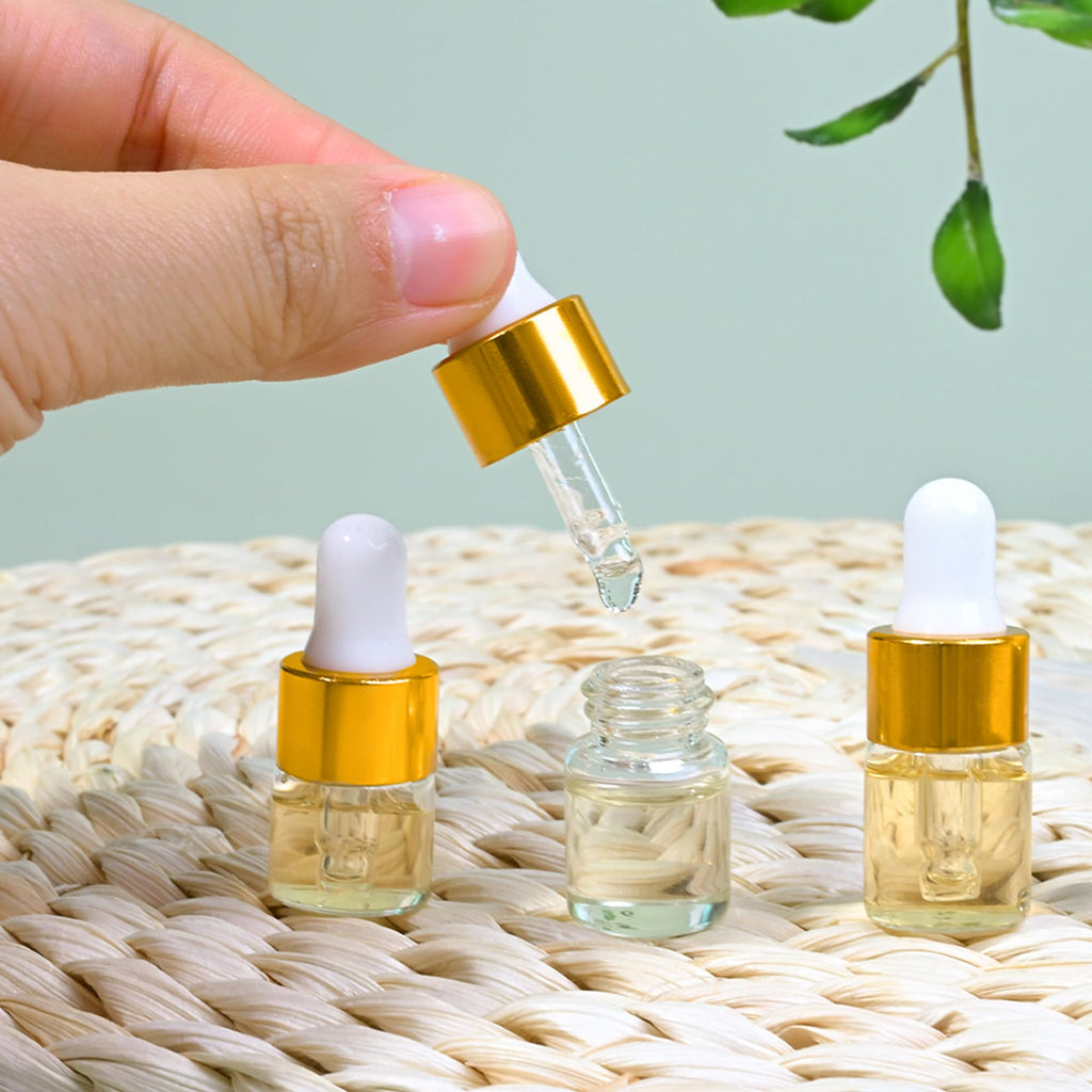 Maydeyy 1ml Mini Glass Dropper Bottles with Gold Cap – Clear Sample Vials for Essential Oil, Perfume & Cosmetics (10/100 Pack)